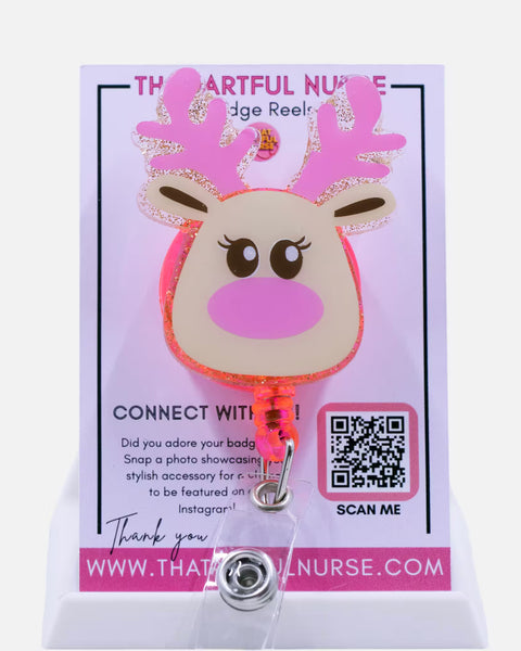 Pink reindeer-themed badge reel with a QR code on a white background