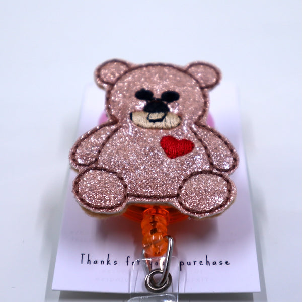 Mr. Cuddle Badge Reel