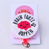 Eye-catching badge reel displaying a brain graphic and the saying 